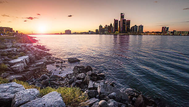Detroit Sunset Detroit Sunset detroit michigan stock pictures, royalty-free photos & images