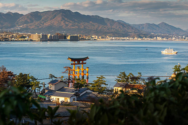 Great floating gate (O-Torii) and Hiroshima city view from Miyaj stock photo