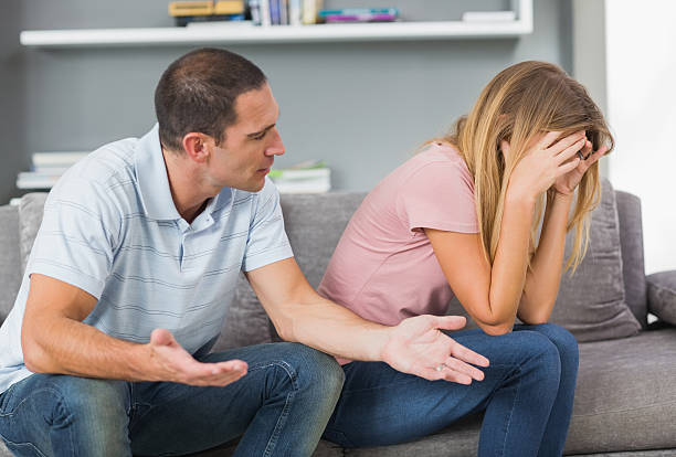 istock Couple sitting on the couch having a fight 494294149