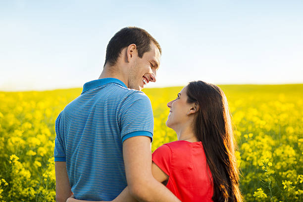 istock Couple in love in field 494295117