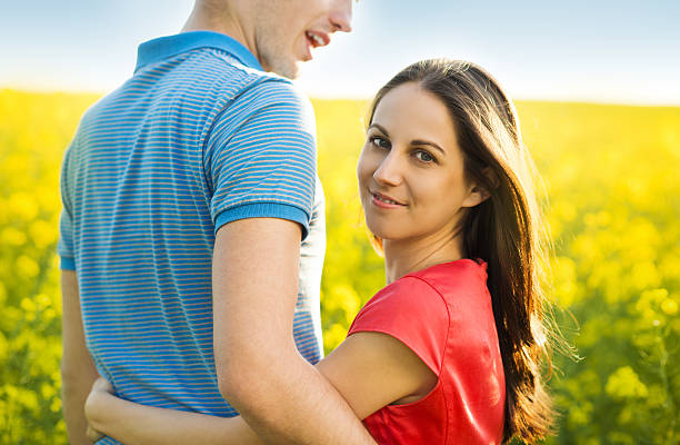 istock Couple in love in field 494295119