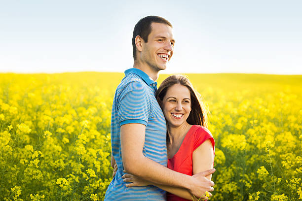 istock Couple in love in field 494295123