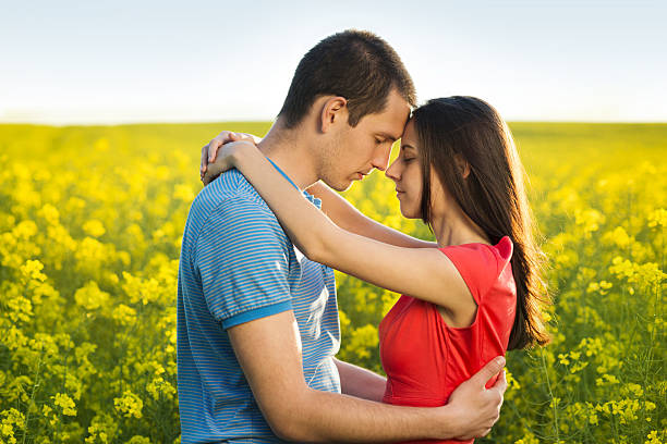 istock Couple in love in field 494295127