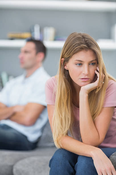 istock Couple not speaking after a fight on the sofa 494297279