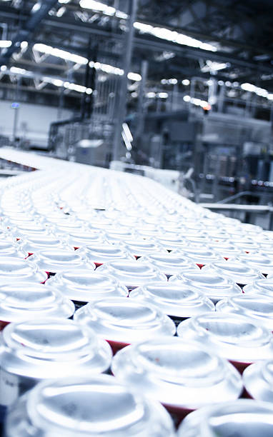 istock Cans on factory conveyer belt 494297531