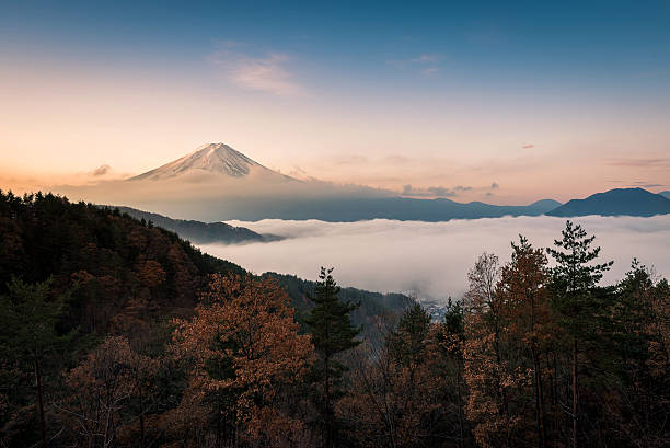 istock Mount Fuji enshrouded in clouds with clear sky 494305304