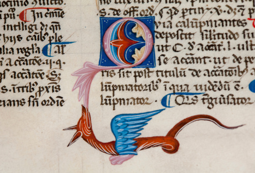 Drollery on the lower margin of a medieval manuscript, showing a dragon