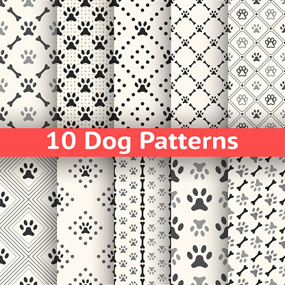 Set of animal seamless vector pattern of paw footprint in repeating rhombus. Endless texture can be used for printing onto fabric, web page background. Dog style. White and black colors.