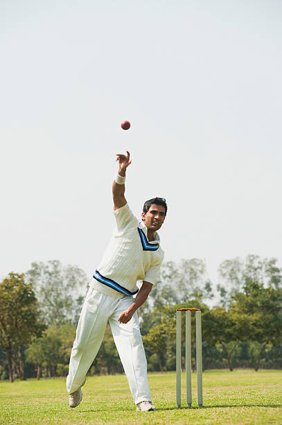 istock Cricket bowler in action 494309656