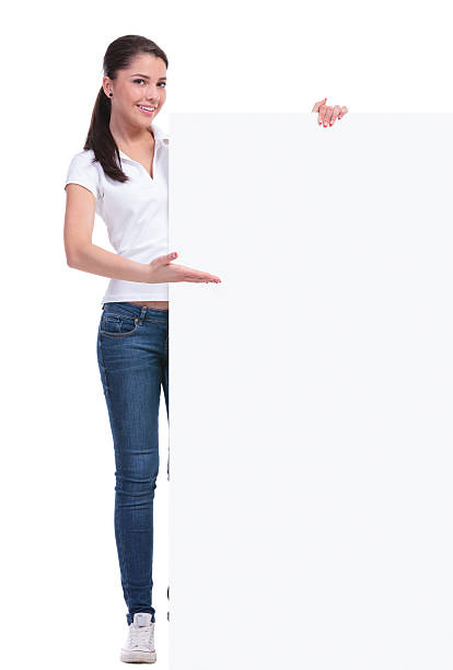 istock casual woman shows big banner 494310859