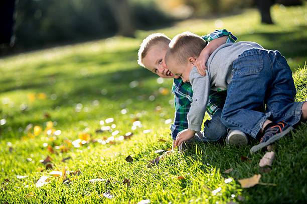 A baby playing in the park.