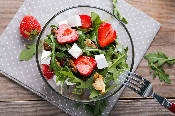 istock Healthy salad on the wooden table 494312649