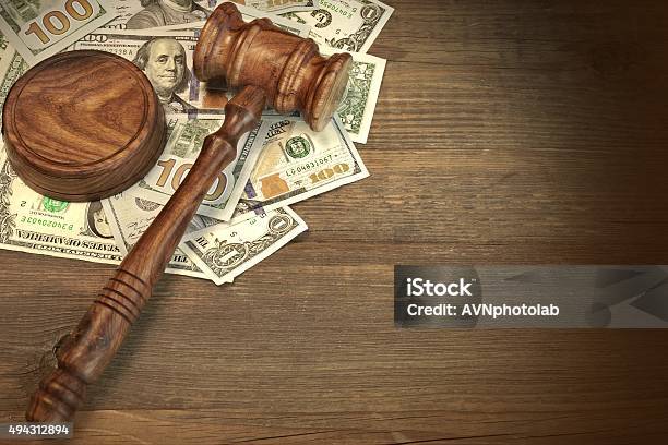 Judges Or Auctioneer Gavel And Money On The Wooden Table Stock Photo - Download Image Now