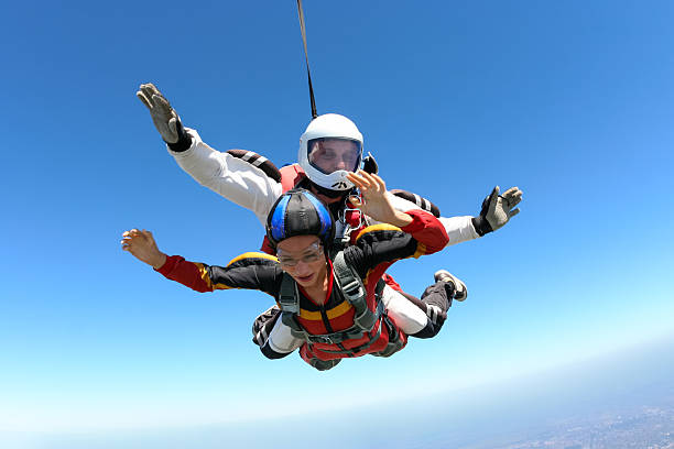 istock Skydiving photo. Tandem. 494313894