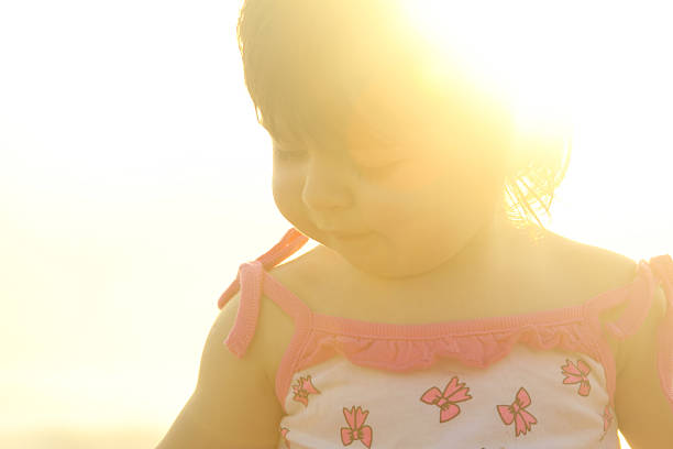 First year playing beach sea toy baby connection sunset First day at sea with his family: country-Uruguay: State - Canelones / Santa Lucia del Este creación stock pictures, royalty-free photos & images