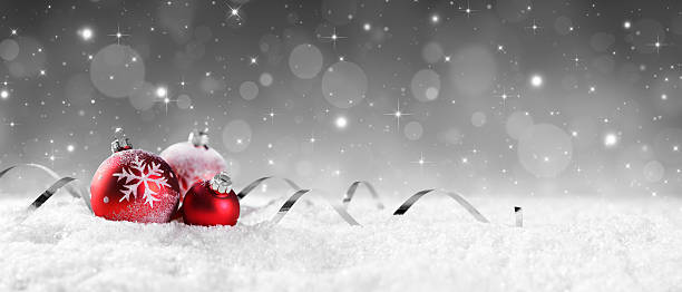 istock Red Baubles On Snow With Sparkling Stars On Silver Background 494314806