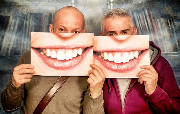 istock Senior Men with Smile Photos in front Them Faces 494319354