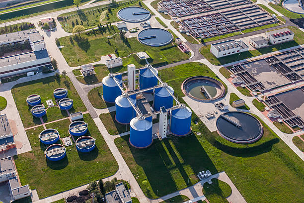 aerial view of sewage treatment plant aerial view of sewage treatment plant in wroclaw city in Poland purified water photos stock pictures, royalty-free photos & images