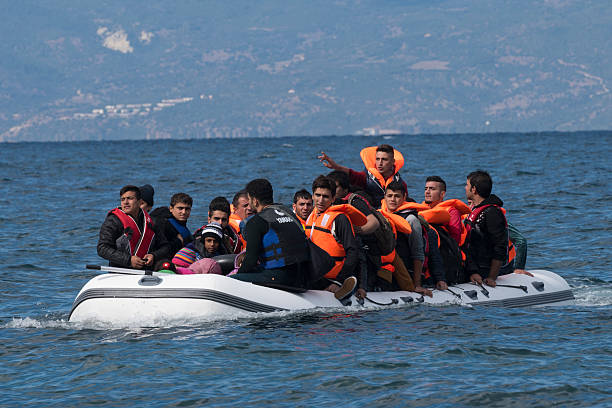 Migrants traveling from Turkey to Greece stock photo