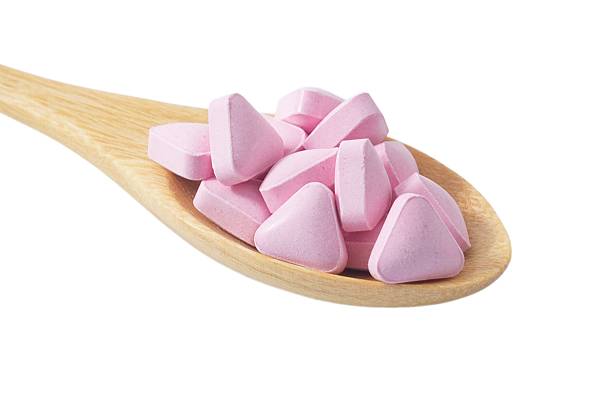 istock Close up Wooden Spoon Full with Vitamins 494339620