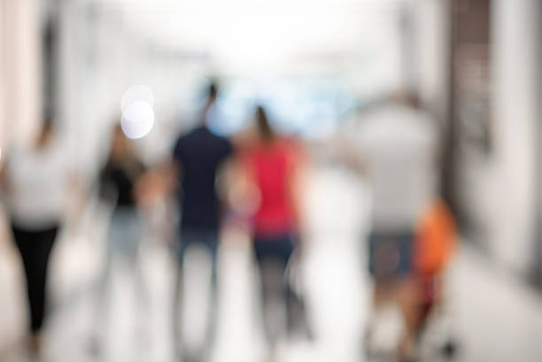 istock silhouettes of unrecognizable people walking, 494342144