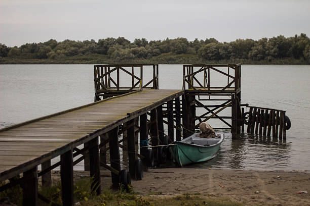 Motorboat by the pier in Sfantu Gheorghe, in Danube Delta