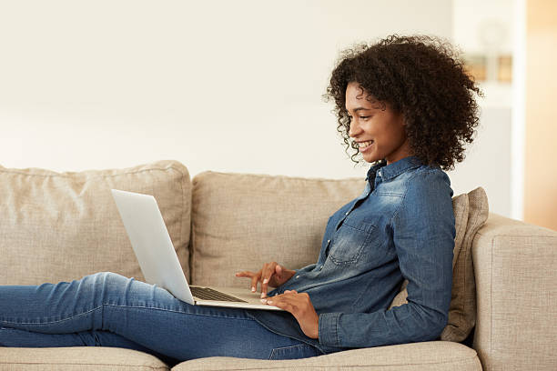 istock Navigating her new laptop 494343080