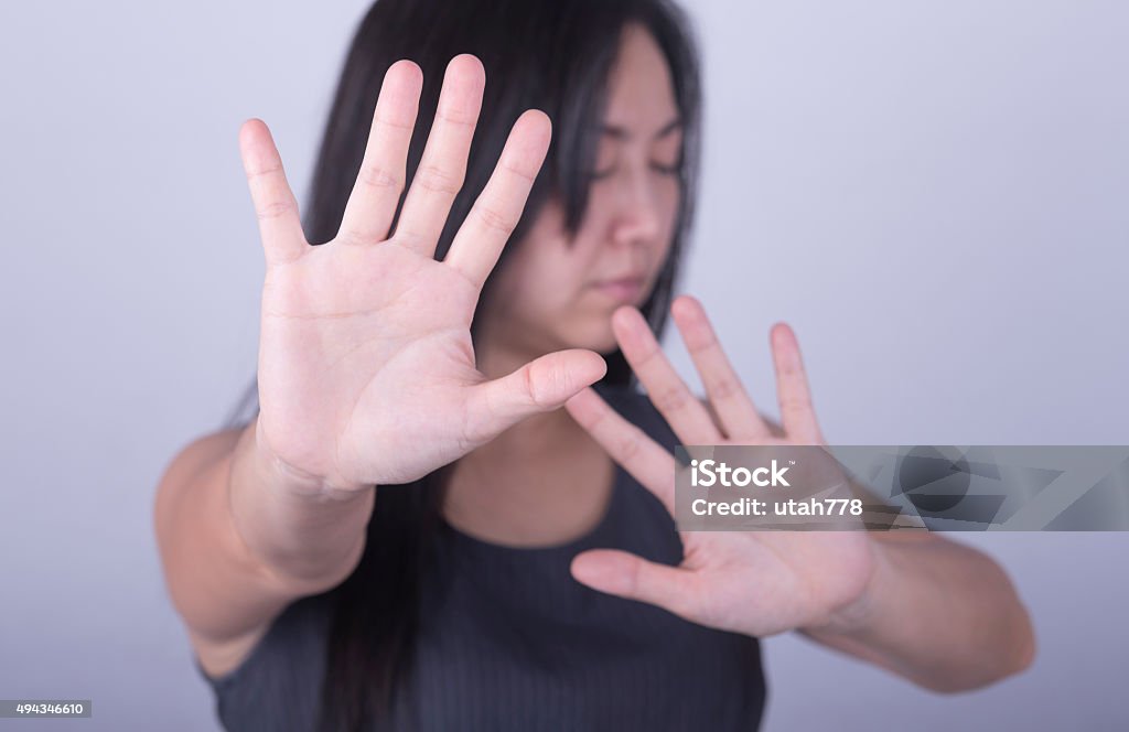 say no woman showing her denial with NO on her hand Rebellion Stock Photo