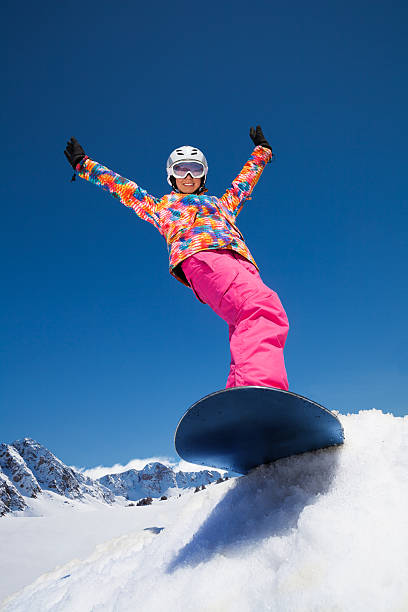 istock Happy girl on snowboard 494348111