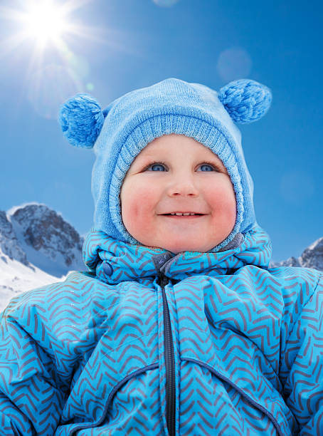 istock Little kid on snow day 494348143