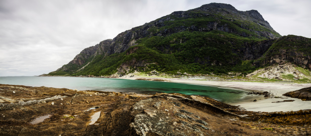 Long exposure panoramic shot of the beach Mjelle in Northern Norway