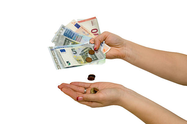 istock hand holding Euro banknotes isolated on a white 494350456