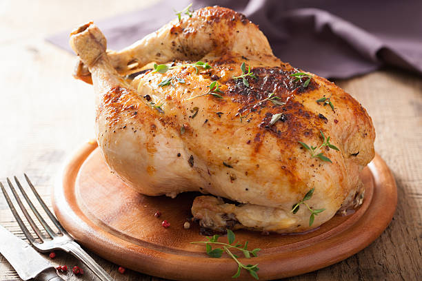 istock whole roasted chicken with pepper and thyme 494350889