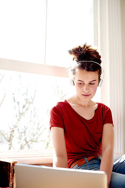 istock Downloading some new music 494351260