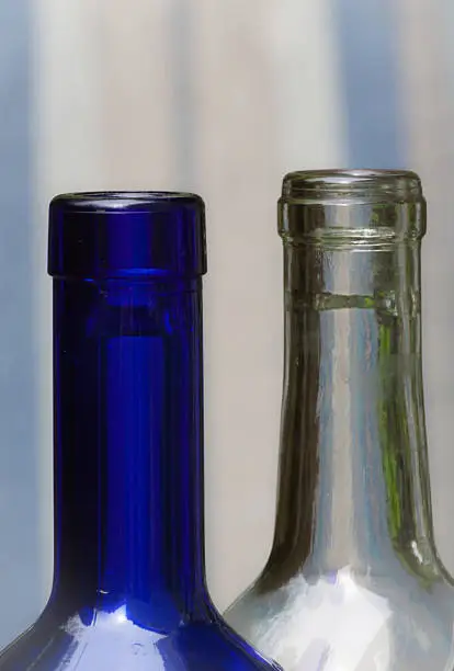 empty Wine bottle necks with backgrounds