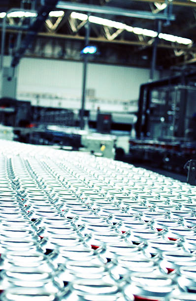 istock Cans on factory conveyer belt 494353215