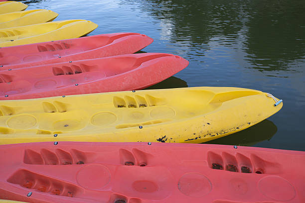 istock canoes moored with on  water. 494354510