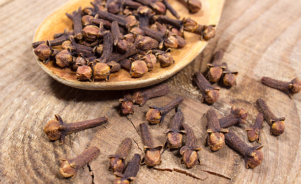 istock Cloves on a wood board. 494354646