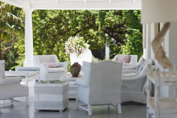 istock White wicker furniture on luxury patio 494358065