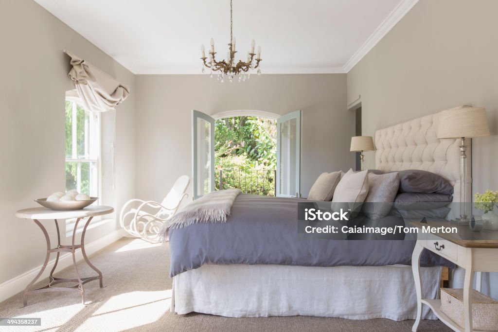 Sunny luxury bedroom  Bedroom Stock Photo