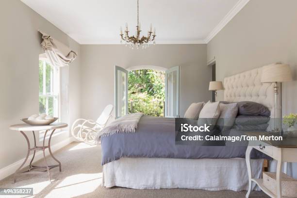 Sunny Luxury Bedroom Stock Photo - Download Image Now - Bedroom, Photography, Architecture