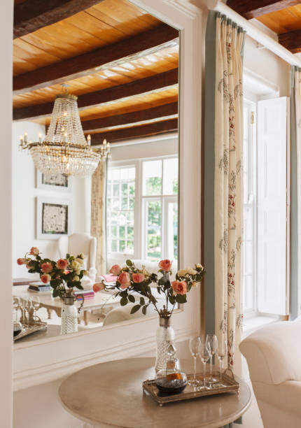 Beautiful flowers in vases in luxury interior