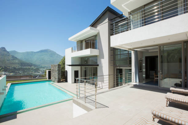 istock Modern house and swimming pool 494358389