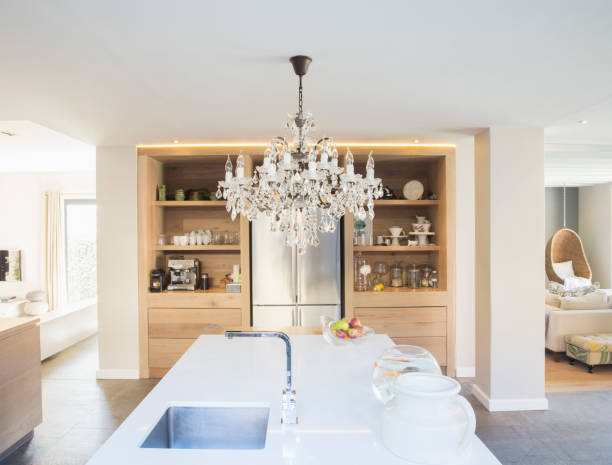istock Chandelier hanging over luxury kitchen island 494358441