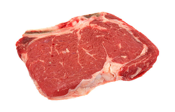 istock Bone in rib eye steak on a white background 494376540