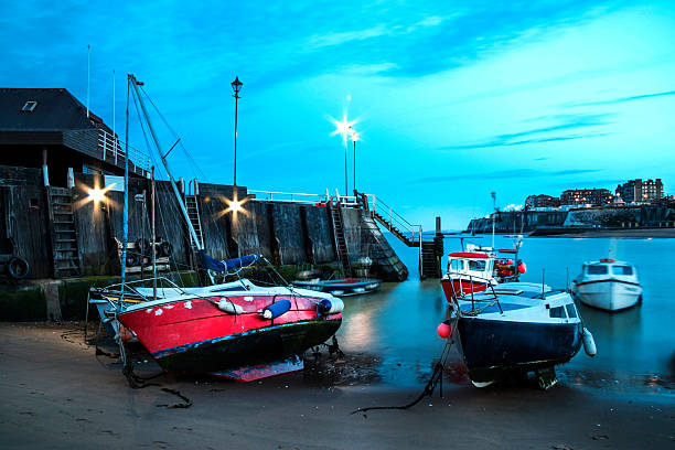 Viking bay harbour' An image taken at dusk, of boats in a harbour. sailboat mast stock pictures, royalty-free photos & images