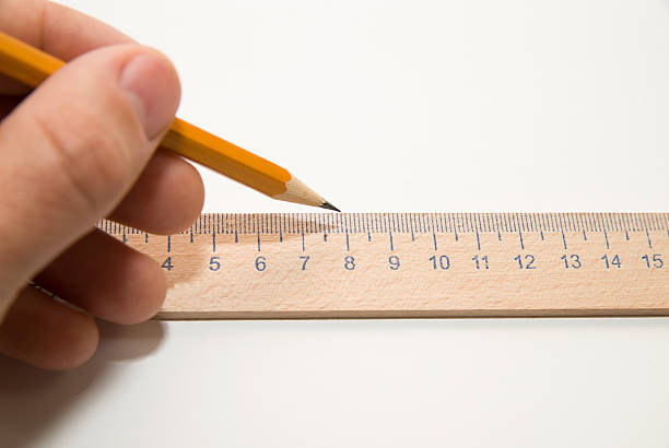 istock Men's left hand holding a pencil on over white 494377338