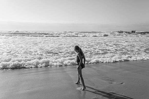 istock Girl Beach Walking Swim 494377750