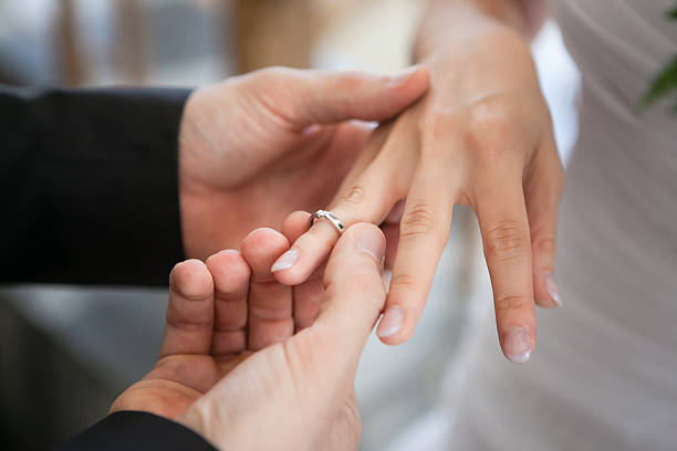istock Man makes woman offer get engaged 494378990