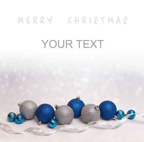Christmas background with blue and white balls